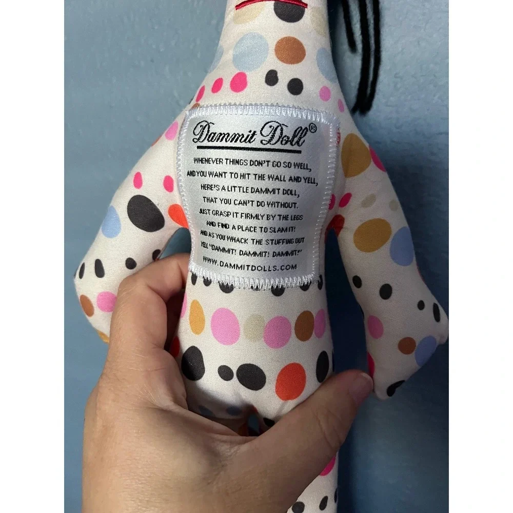 Dammit Doll embrace touch